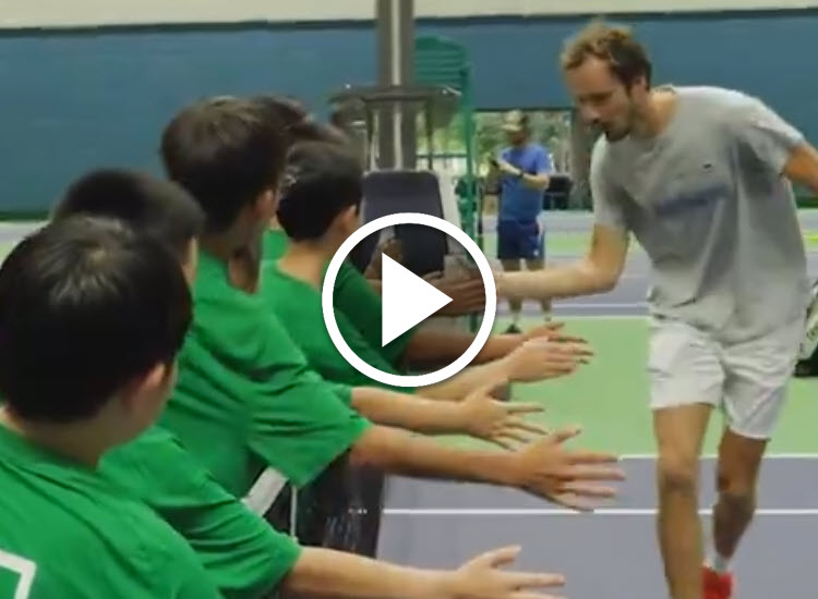 Medvedev plays left handed vs. ball kids in Shanghai