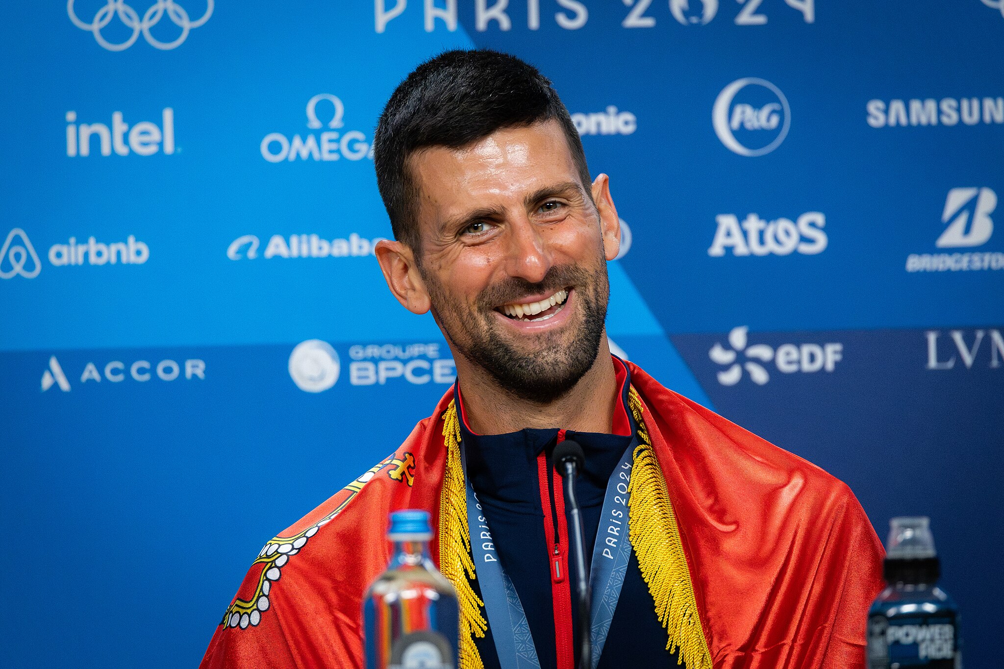 Why Novak Djokovic Should Stay Around to Win Another Major